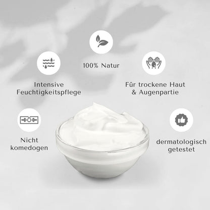 palmölfreie Naturkosmetik-Creme in Glasschale, umgeben von Icons: 100 % Natur, intensive Feuchtigkeitspflege, für trockene Haut &amp; Augenpartie, nicht komedogen, dermatologisch getestet